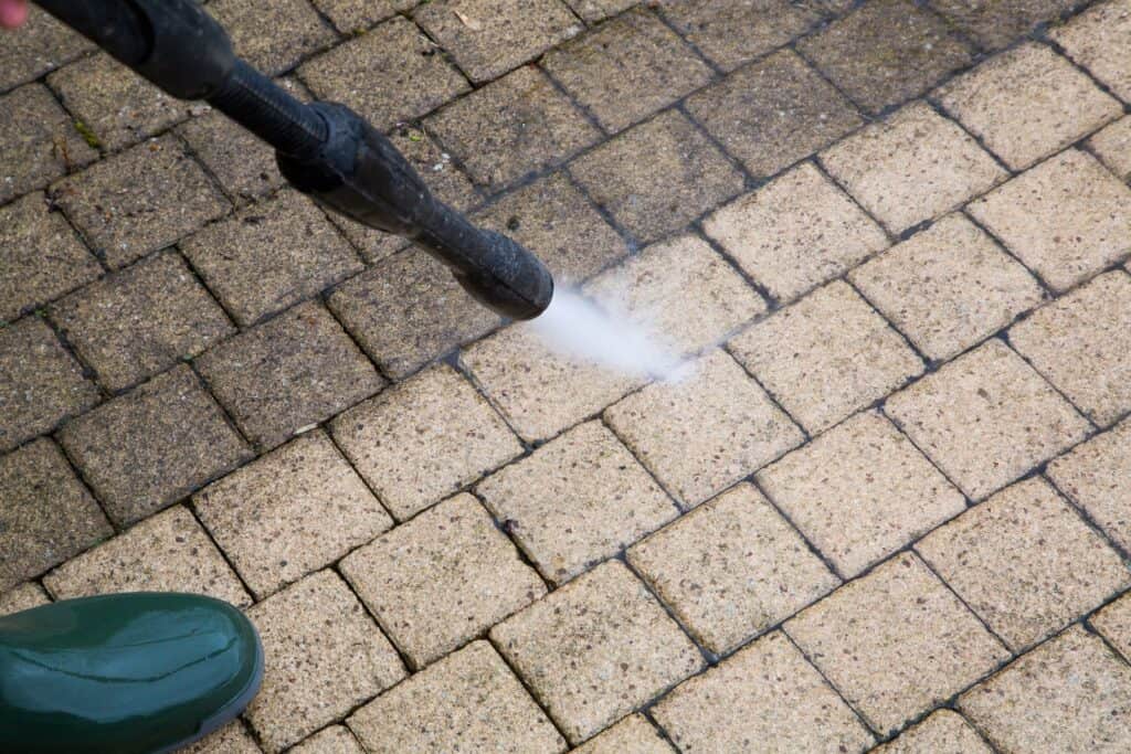 Stone patio pressure washing in progress